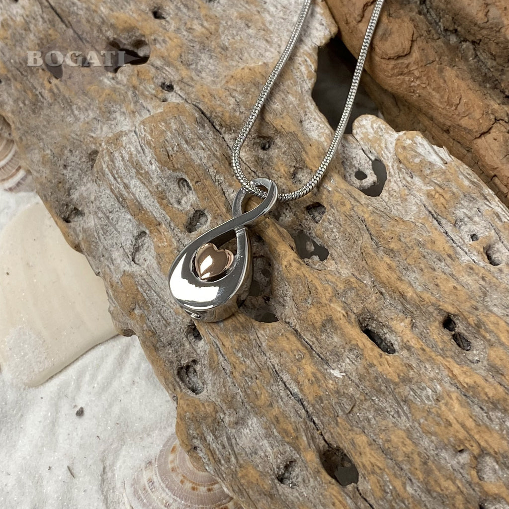 J-997 - Infinity Symbol with rose gold Heart